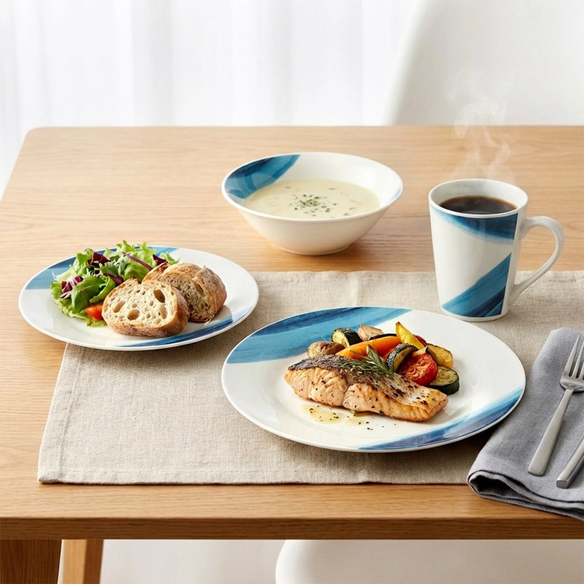 Serwis obiadowy 16 elementów zestaw talerzy z kubkami dla 4 osób w kolorze biało niebieskim Vilde
