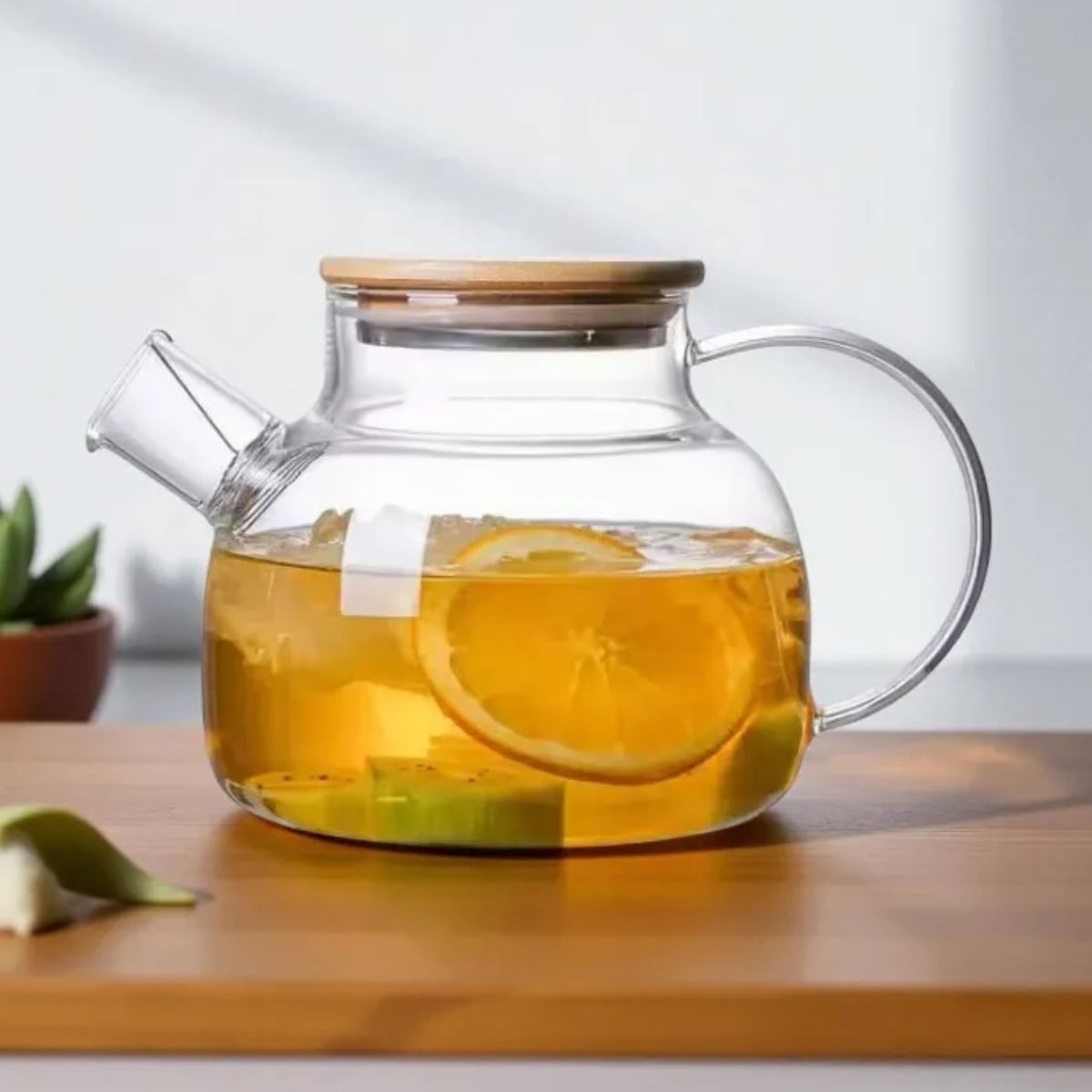 Szklany dzbanek do herbaty i naparów ziołowych z sitkiem i pokrywką 1,0 l Tragar